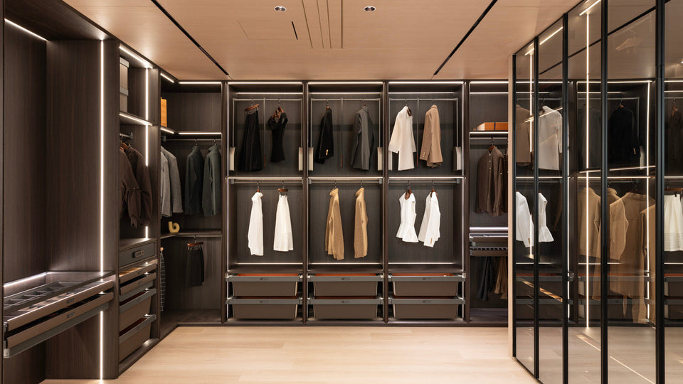 The Noir Wardrobe at KnoxOne’s Braeside showroom with integrated lighting around hanging bays and shelves.